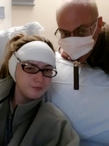 My Dad and I taking a hospital selfie. I was rocking the taped on glasses, him the mask and, yes, that is a cigar.